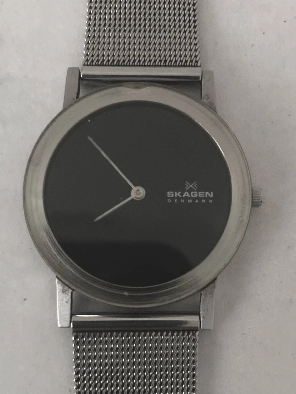 Skagen Modern Unisex Silver Mesh Watch with Black Dial.
